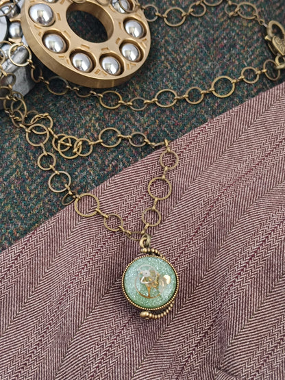 Sautoir steampunk pendentif mappemonde pivotant chaîne gros anneaux
