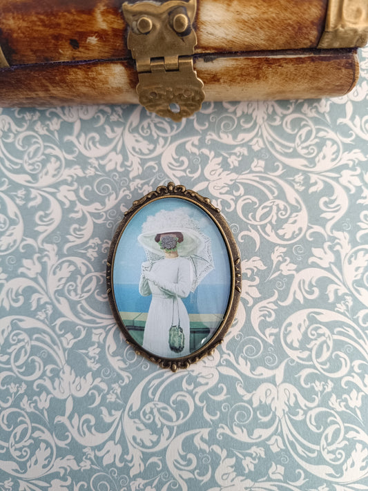 Broche cabochon verre – Illustration René Magritte
