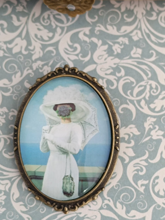 Broche cabochon verre – Illustration René Magritte