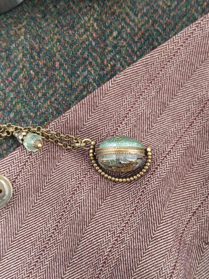 Collier sautoir chaîne steampunk pendentif mappemonde pivotant