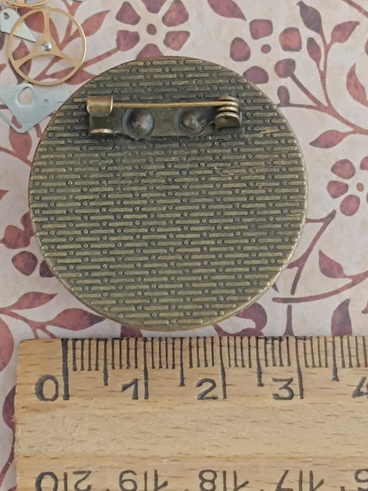 broche dôme de résine époxy  Steampunk